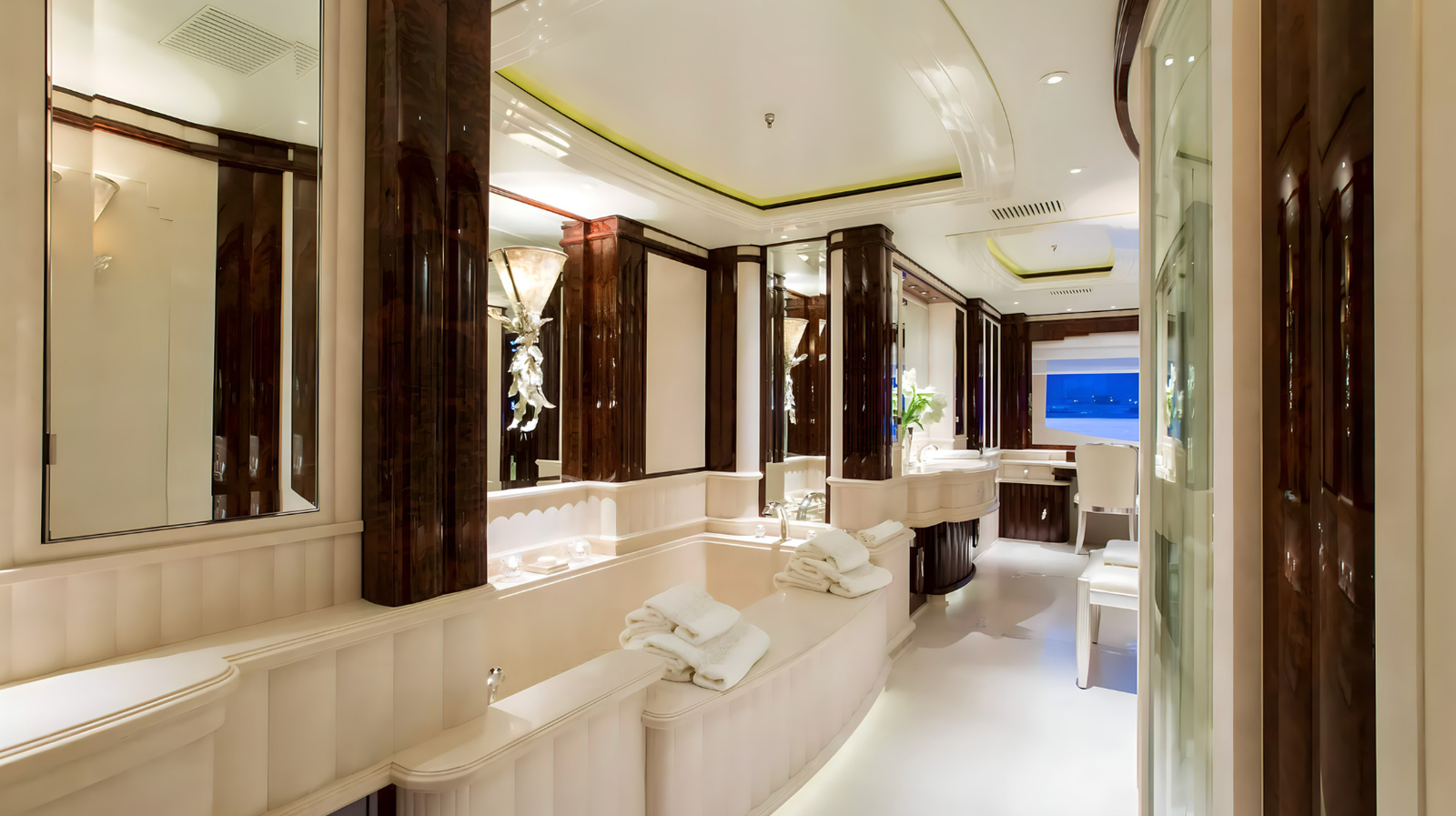 Luxury full beam master suite on the Lioness V superyacht with Argent Design styling