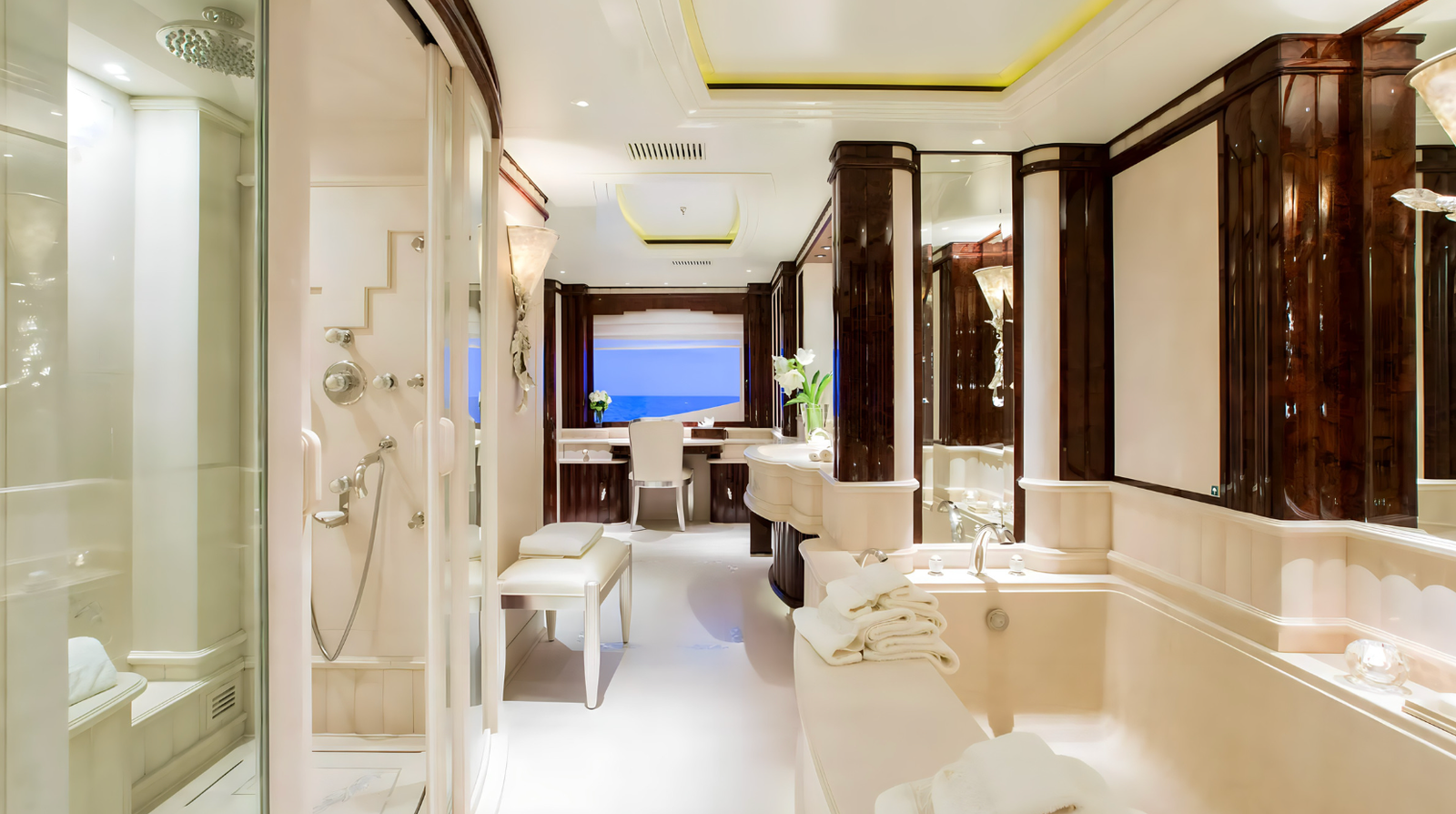 Luxury full beam master suite on the Lioness V superyacht with Argent Design styling