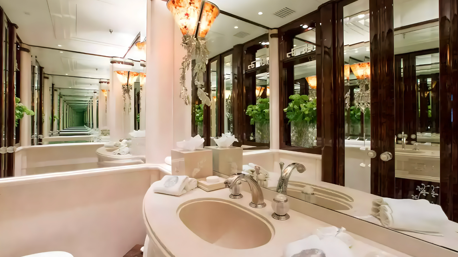 Luxury full beam master suite on the Lioness V superyacht with Argent Design styling