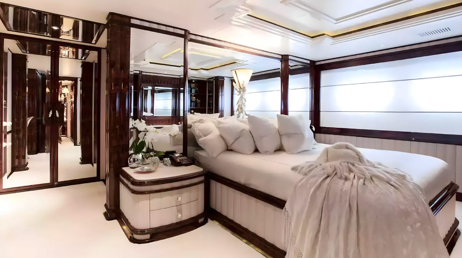 Luxury full beam master suite on the Lioness V superyacht with Argent Design styling