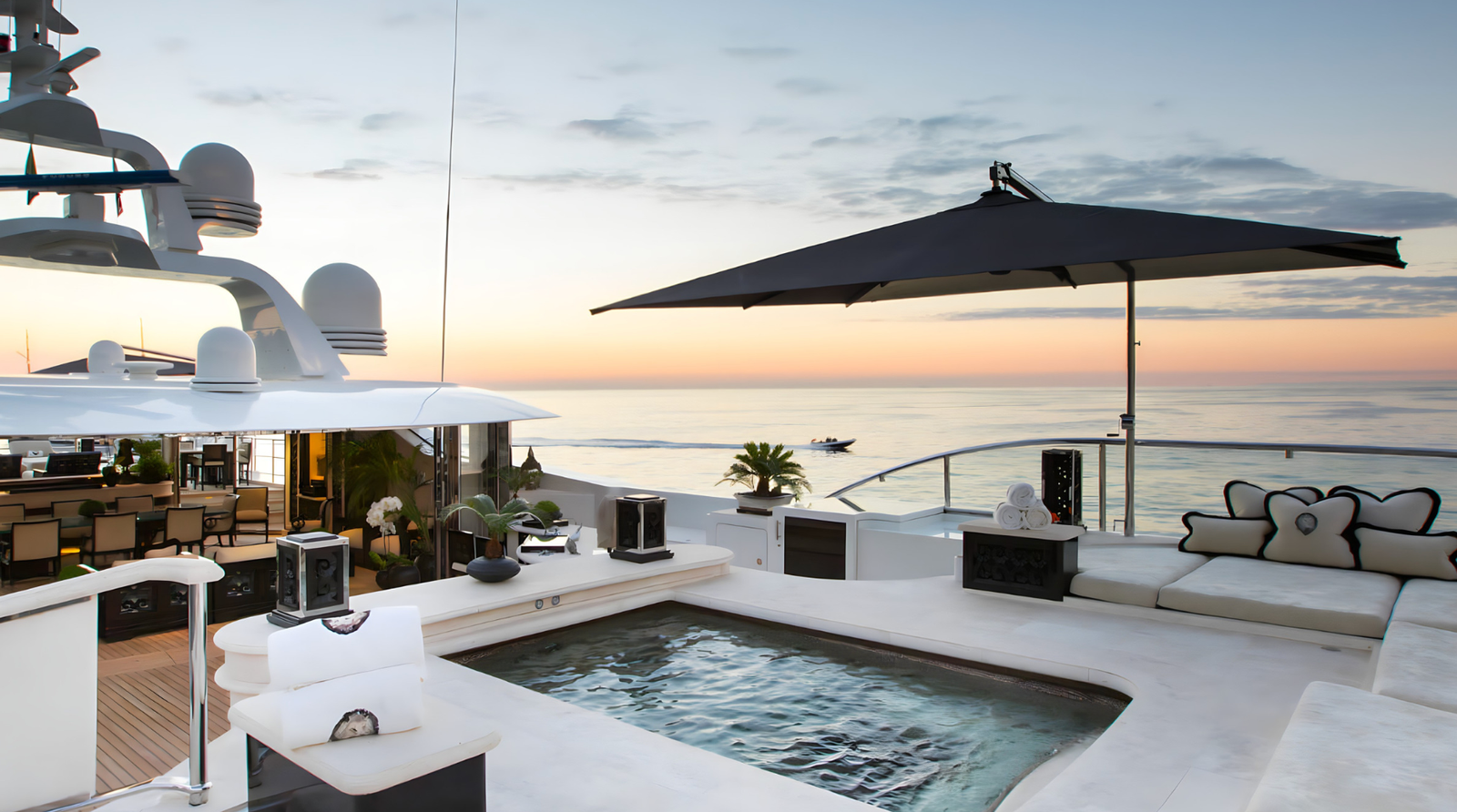 Spacious sun deck jacuzzi on Lioness V overlooking the ocean.
