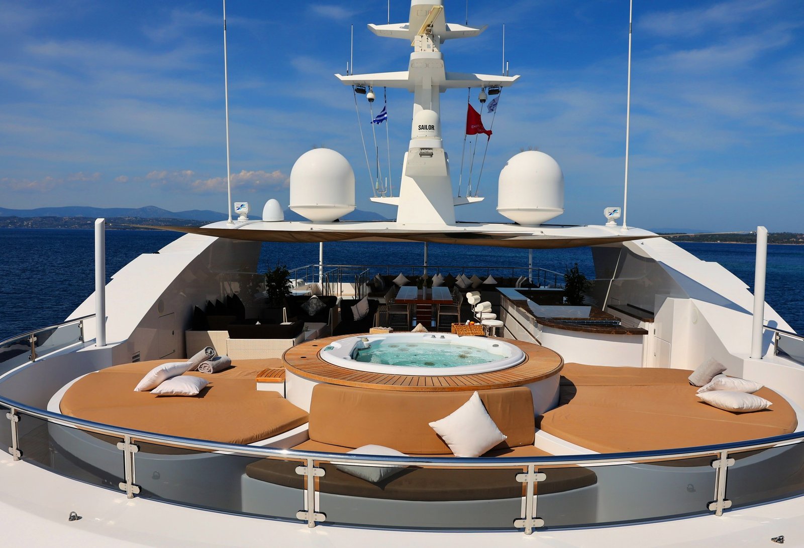 Luxury motor yacht charter with beach club and water toys