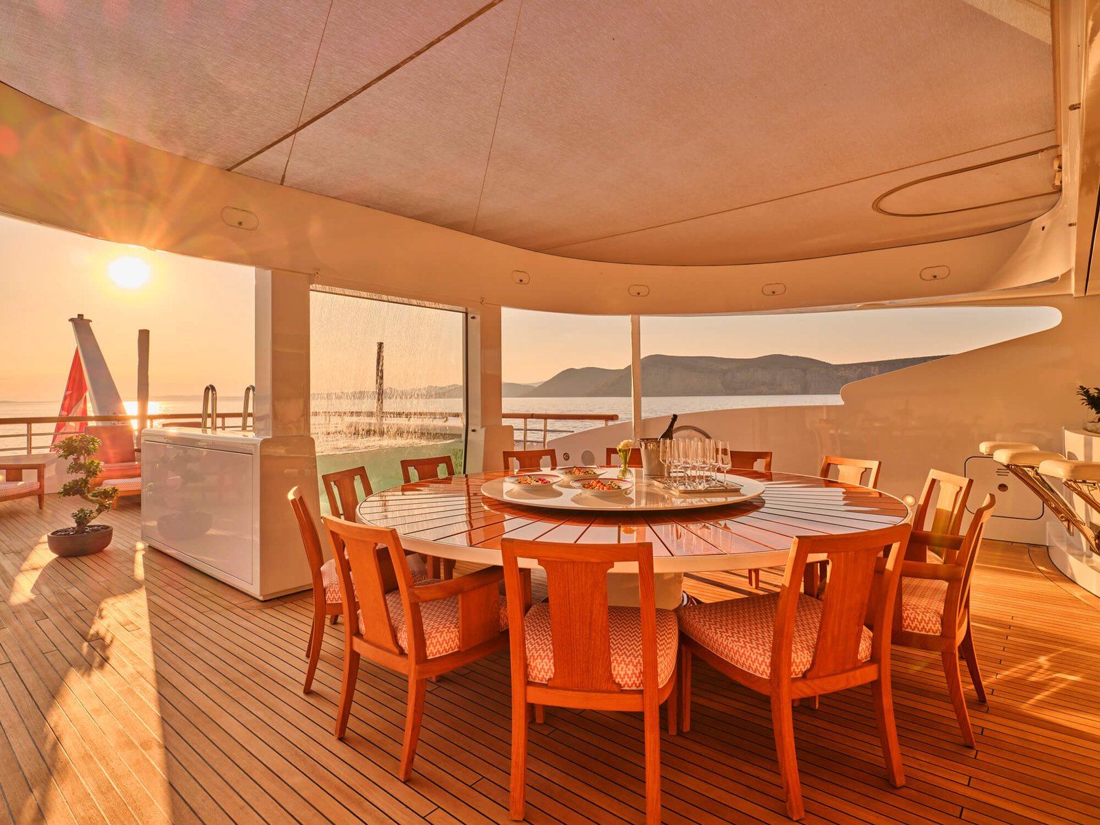 Waterfront beach club and gym area on the Benetti SEAKID II yacht charter.