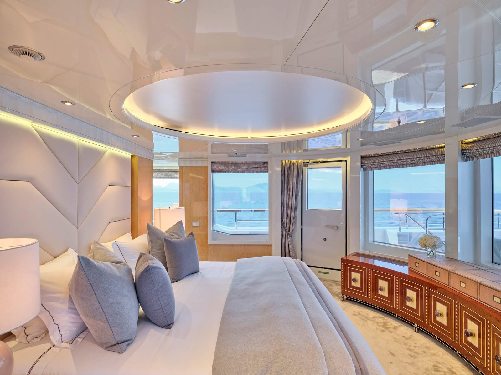 Luxury upper deck master suite on the SEAKID II yacht charter with 180-degree views.