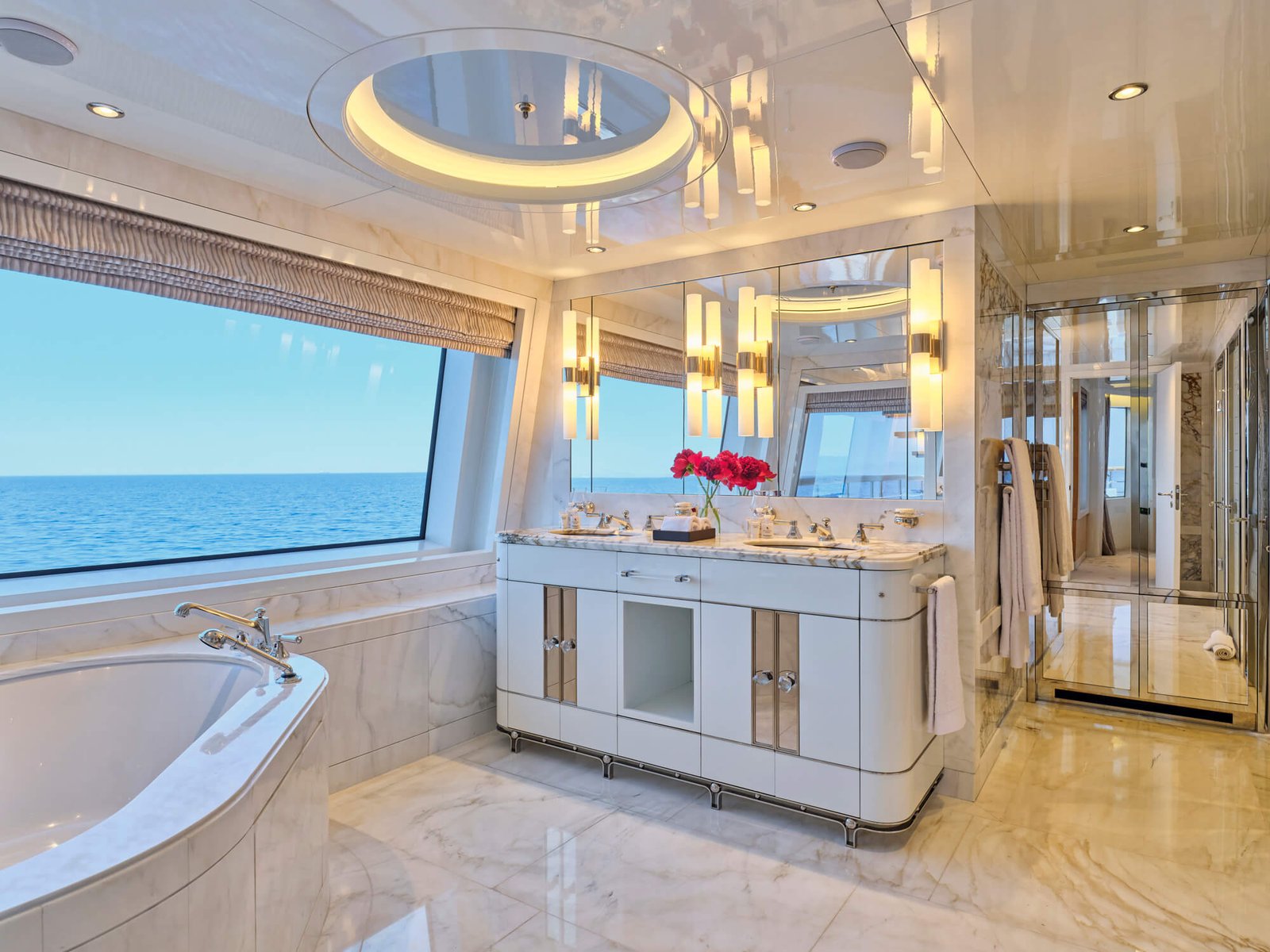 Luxury upper deck master suite on the SEAKID II yacht charter with 180-degree views.