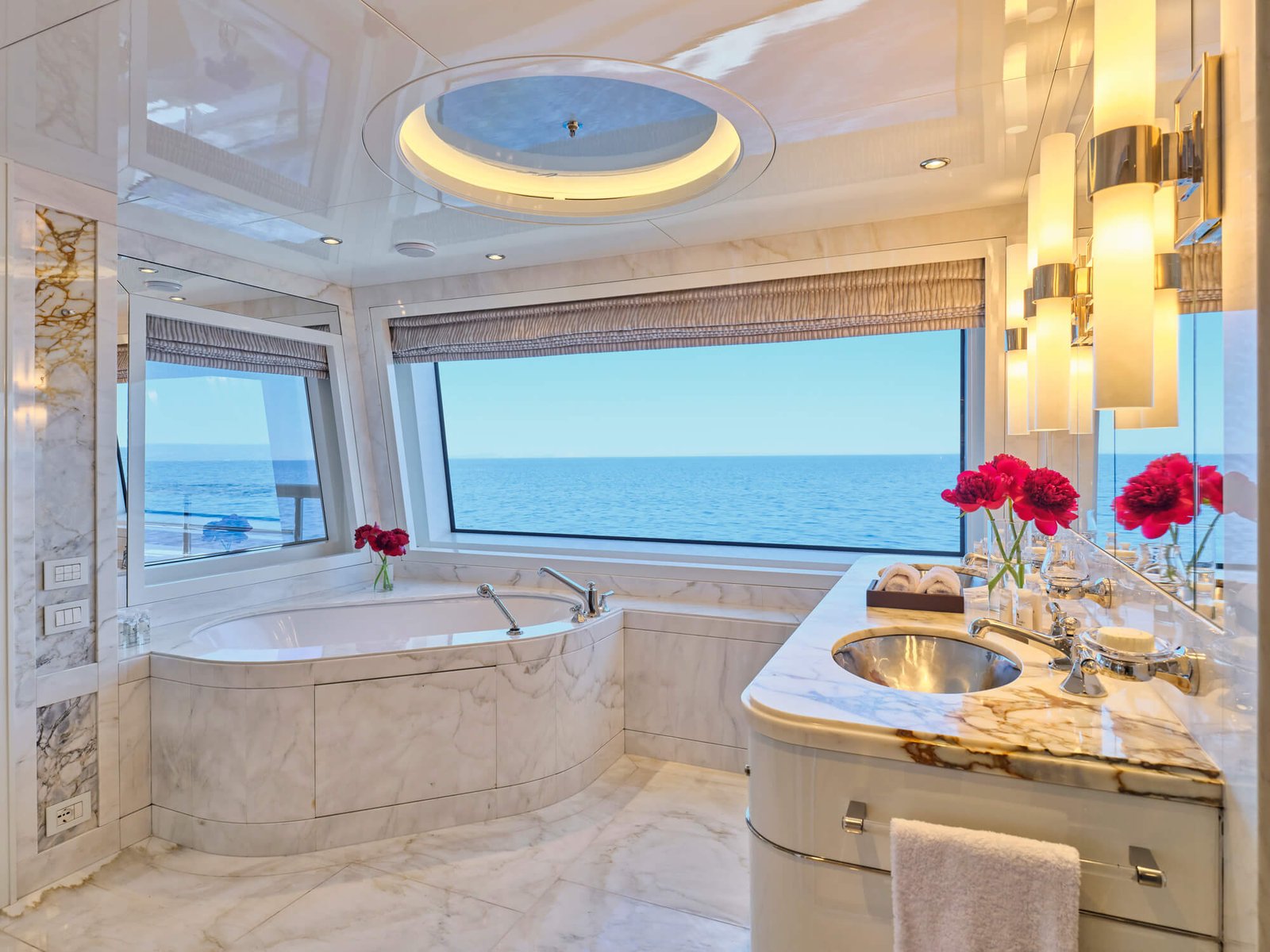 Luxury upper deck master suite on the SEAKID II yacht charter with 180-degree views.