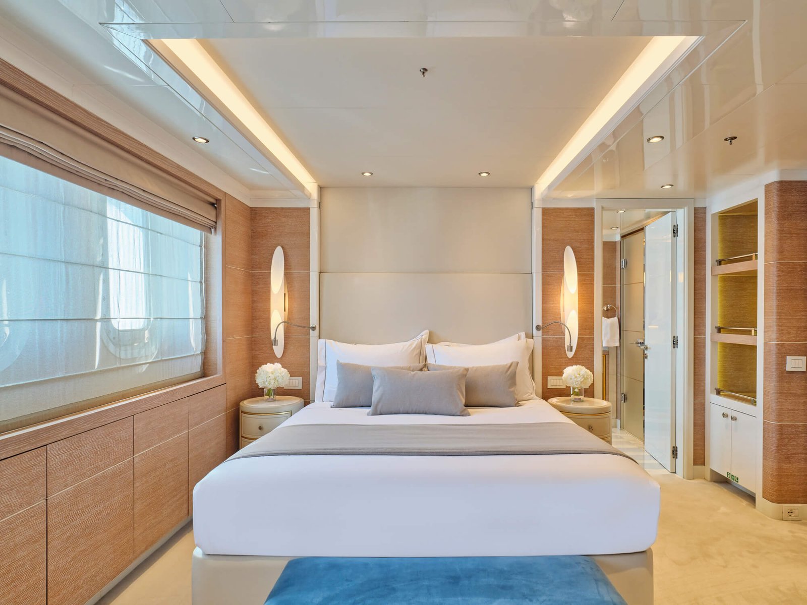 Luxury upper deck master suite on the SEAKID II yacht charter with 180-degree views.