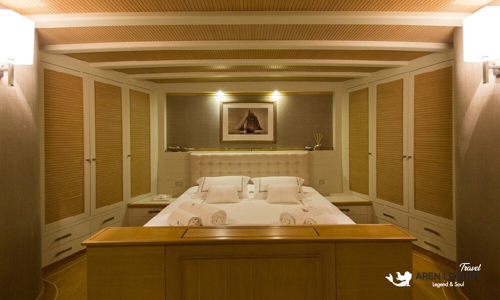 Cobra King luxury gulet master cabin with queen-size bed and elegant decor