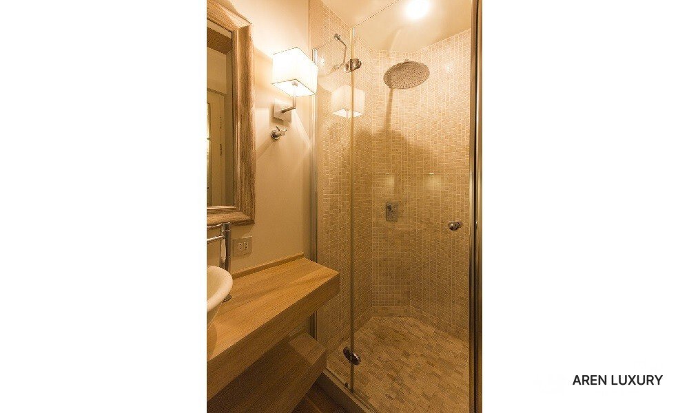 Cobra King luxury gulet modern walk-in shower with premium tiling and lighting