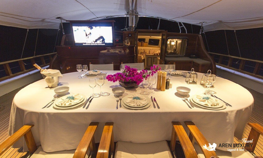 Cobra King gulet luxury dining table setup for private charter guests