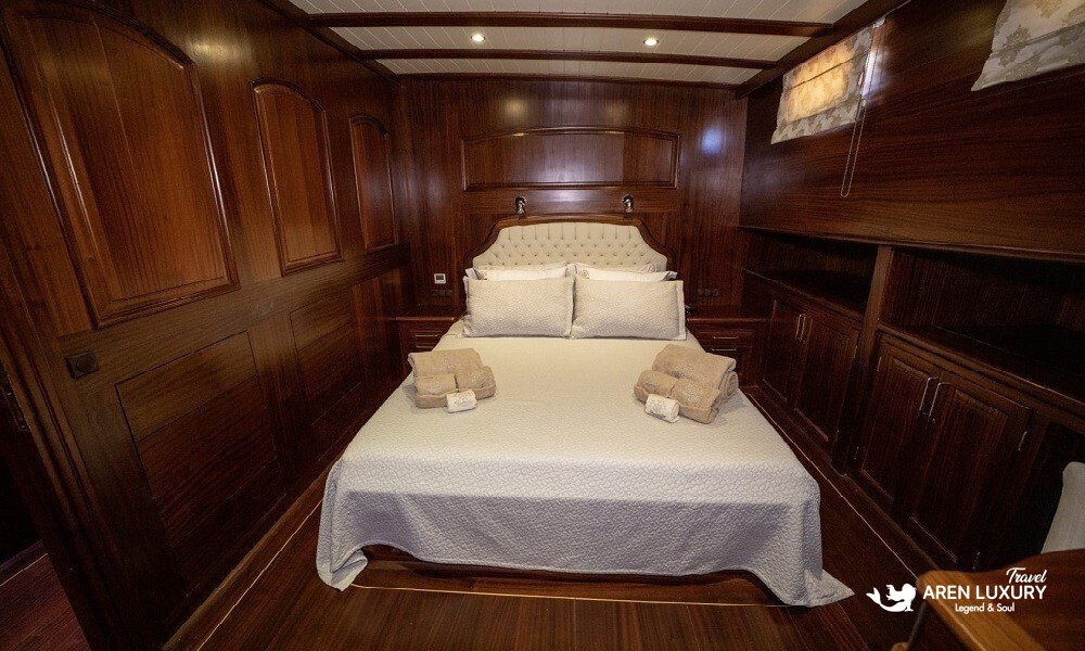 Traditional wooden guest cabin on the Gulet Arif Kaptan A for luxury Turkish charters.