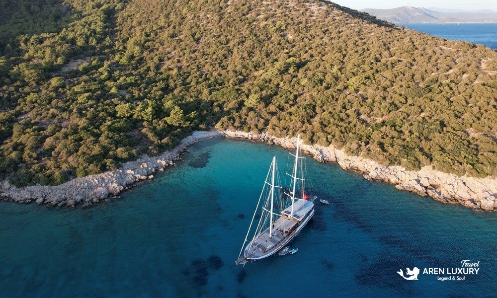 Luxury gulet Arif Kaptan A anchored in a quiet bay during a private gulet charter in Turkey