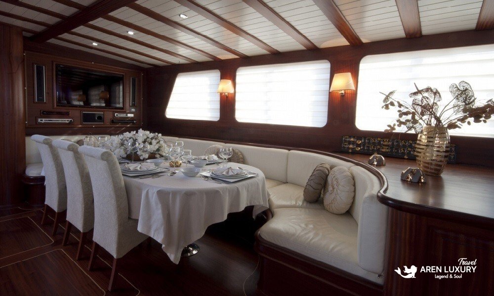 Arif Kaptan A gulet charter Turkey interior dining area with luxury seating