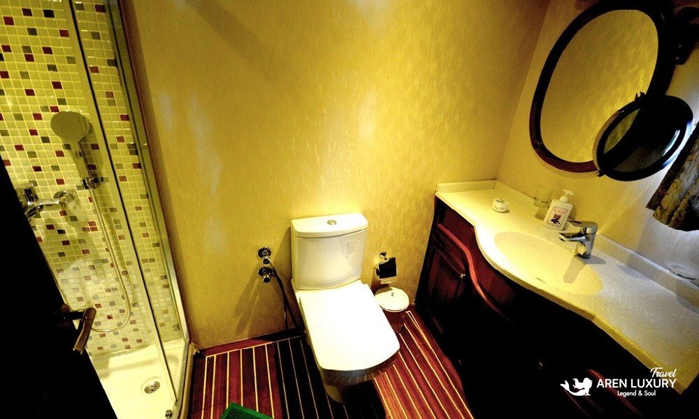 Gulet C Taner 2 Charter Turkey En-suite Bathroom Modern en-suite bathroom with shower and vanity on a Gulet C Taner 2 Charter Turkey.