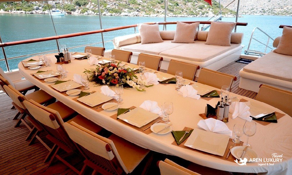 Alfresco dining area for 16 guests on a Gulet C Taner 2 Charter Turkey. Alfresco dining area for 16 guests on a Gulet C Taner 2 Charter Turkey.