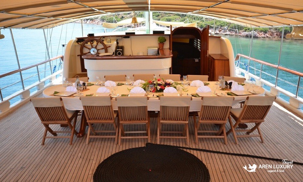 Gulet C Taner 2 Charter Turkey Dining Large group dining area on a Gulet C Taner 2 Charter Turkey in a secluded bay