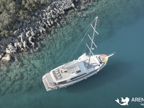 Aerial view of Gulet Charter Albatros M anchored in the clear turquoise waters of Goce