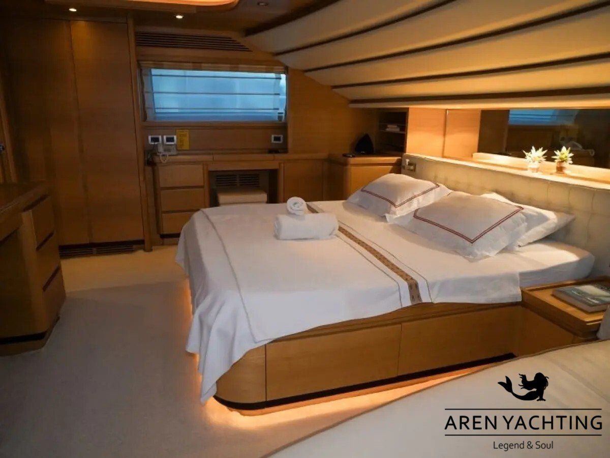 Luxury double cabin guest stateroom with under-bed ambient lighting inside the FUNDA D motor yacht for charter in Göcek.